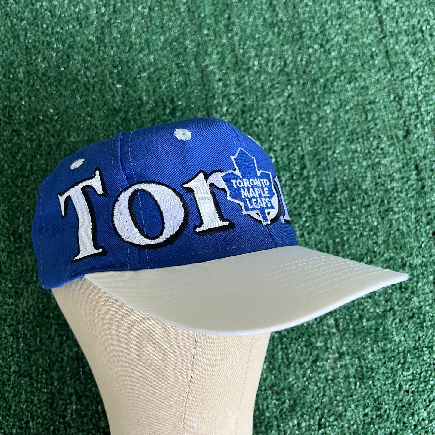 90s Logo 7 NHL Toronto Maple Leafs Spellout Blue Snapback Hat