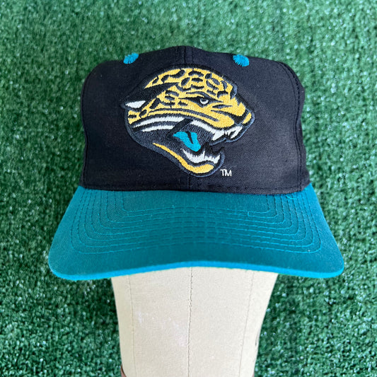 90s Logo 7 NFL Jacksonville Jaguars Black Snapback Hat