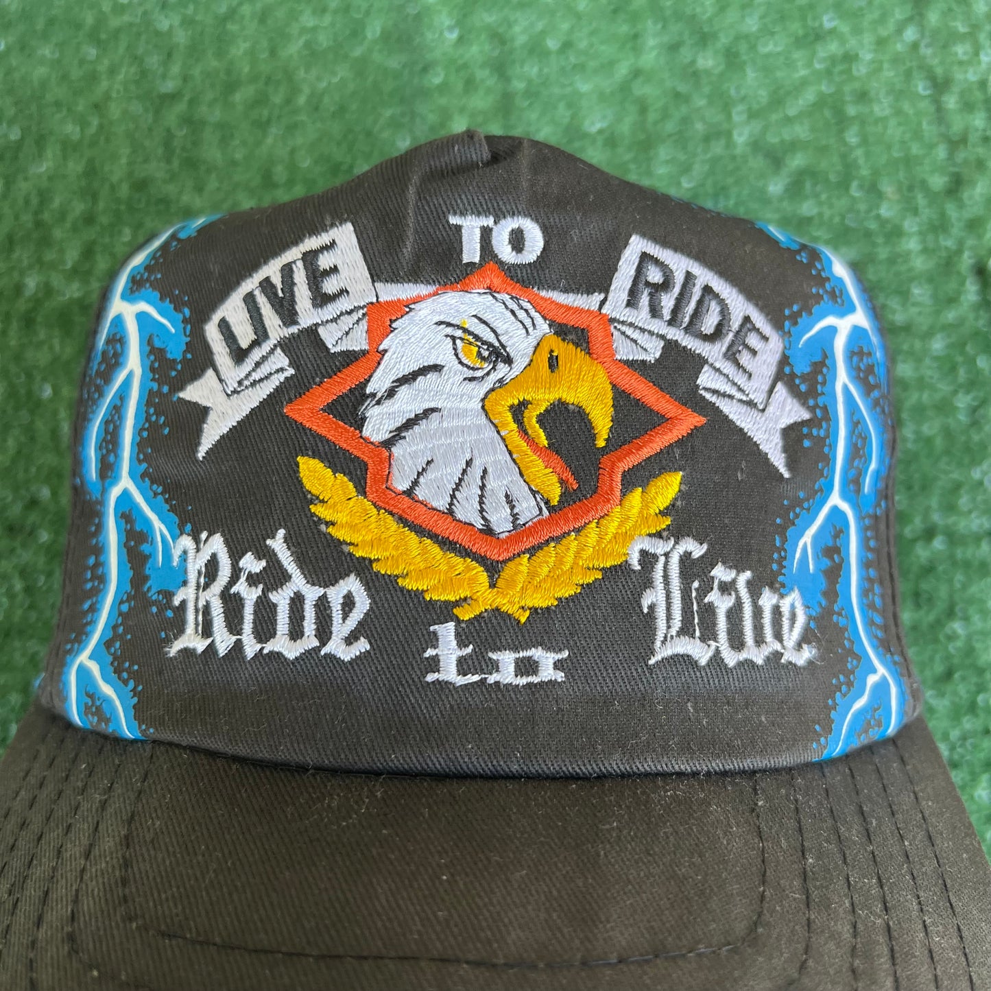 90s "Live to Ride Ride To Live" Bald Eagle AOP Faded Black Lightning Snapback Hat