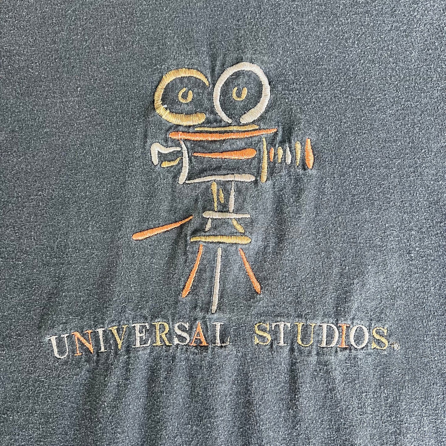 90s Universal Studios Embroidered Spellout Camera Faded Black T-Shirt - XL